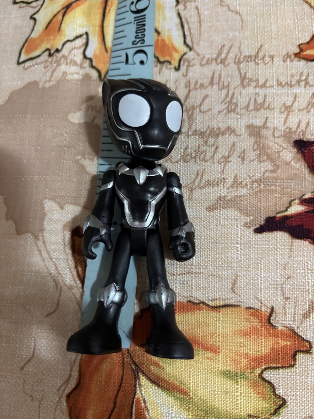 Black and Silver Superhero Vinyl Figure